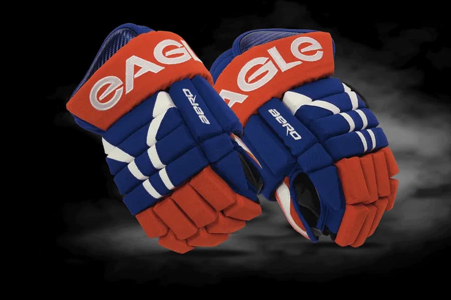 Pair of blue, red and white Eagle Aero custom hockey gloves