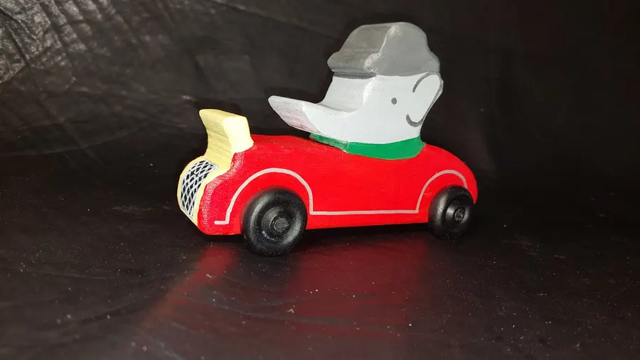 Red wooden character car made by Peter’s Wooden Toys