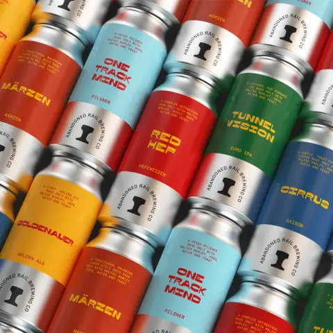 Stacked cans of Abandoned Rail beers