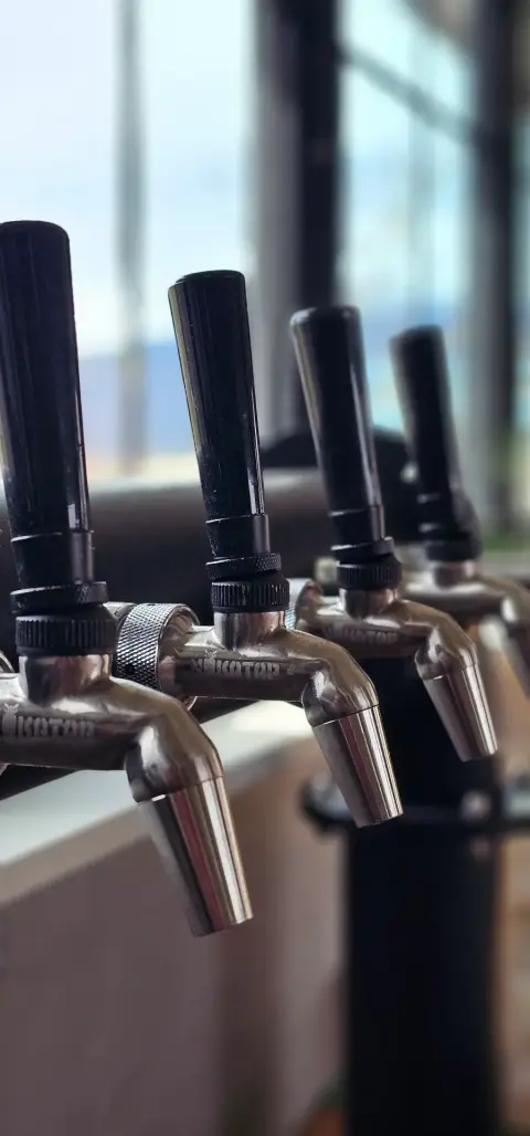 Tap faucets in the Abandoned Rail taproom