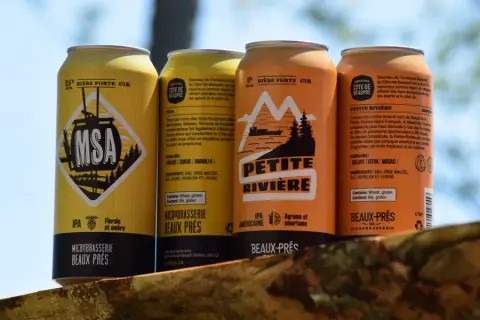 Cans of MSA IPA and Petite Rivière American IPA from Beaux Prés Microbrasserie