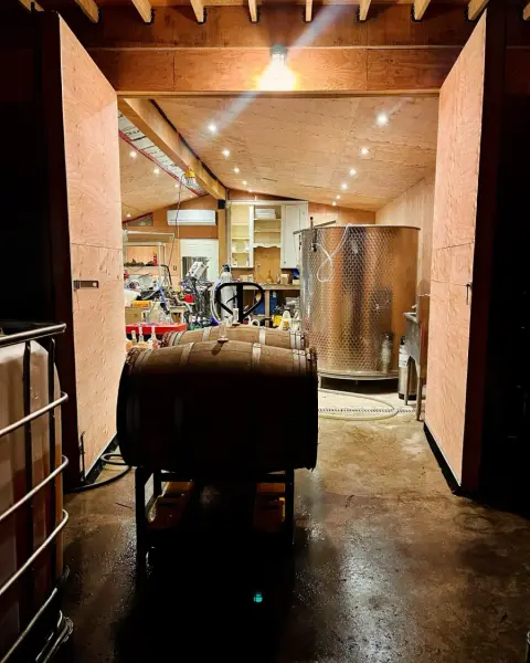 Barrels and tanks inside the cider house