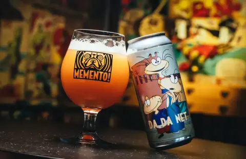 A Memento can with its own label art