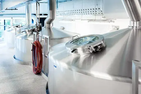 Stainless brewing vessels in the Brasseurs RJ brewhouse