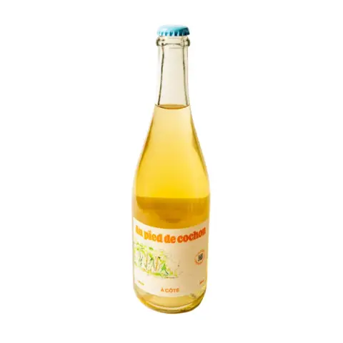 A bottle of À côté, Au Pied de Cochon's traditional-method farm cider