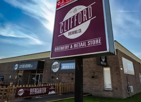 Clifford Brewing Co. brewery and retail store sign in Hamilton
