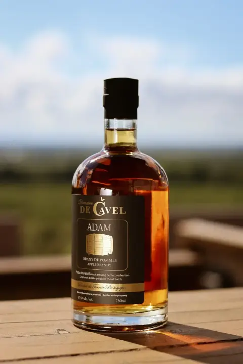 A bottle of Domaine de Cavel Adam apple brandy