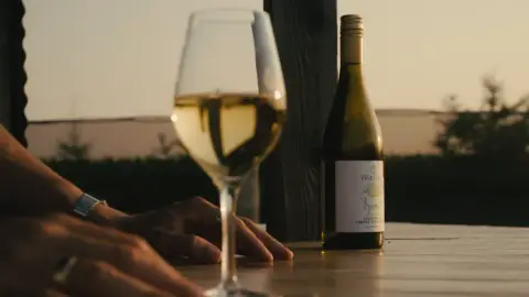 A Vineterra bottle and glass