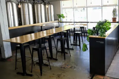 Faculty Brewing tasting room beside the tanks