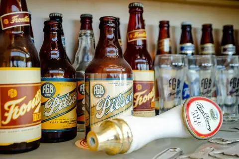 Historic Fort Garry Brewing bottles and beer taps