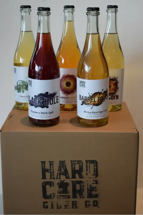 The Hardcore Cider Co. bottle lineup on a white background