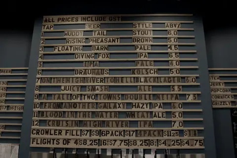 Letter-board tap list in the High River taproom