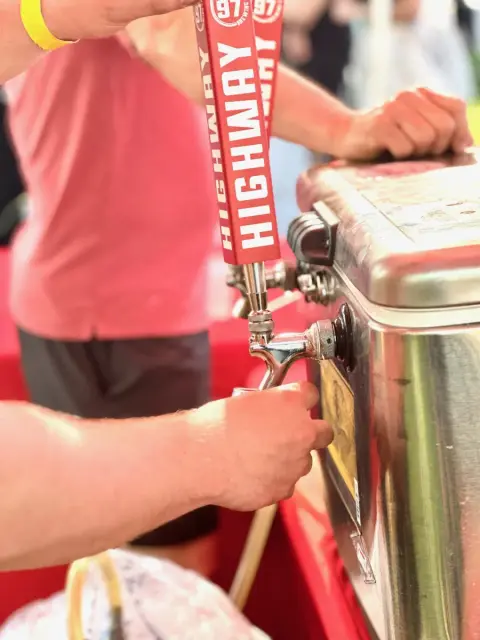 Pouring from a Highway 97 Brewery tap handle