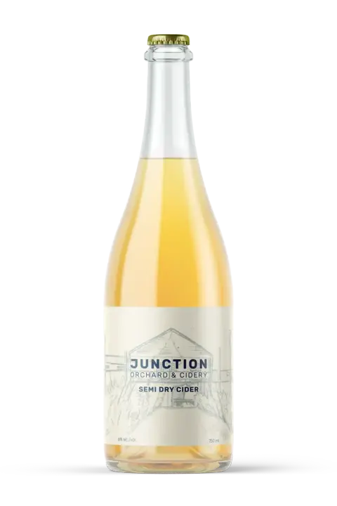 A bottle of Junction Orchard & Cidery Semi Dry cider
