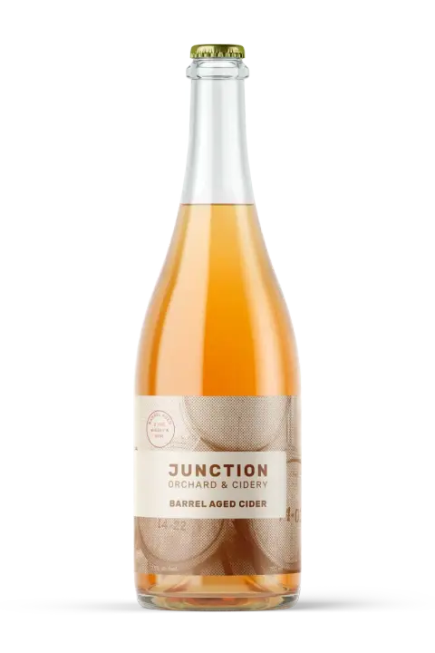 A bottle of Junction Barrel Aged cider
