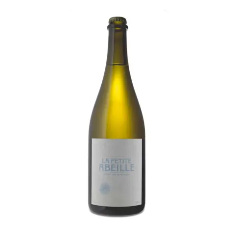 A bottle of La Petite Abeille Sparkling Pear Cider