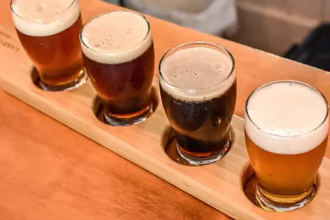 Flight of Lake on the Mountain beers on a wooden paddle
