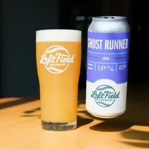 Can and glass of Left Field Ghost Runner IPA