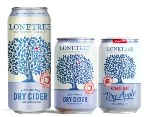 Cans of Lonetree Authentic Dry Cider in two sizes beside an alcohol-free Dry Apple can