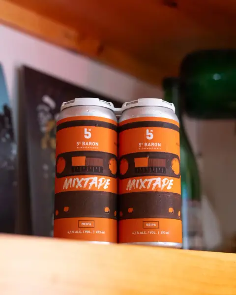 Two cans of 5e Baron Mixtape NEIPA