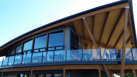 Timber-framed Microbrasserie Côte-du-Sud building and terrace in Montmagny