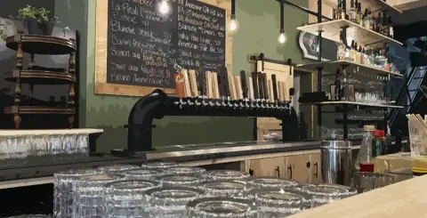 The tap wall and bar at the L'Hermite resto-pub