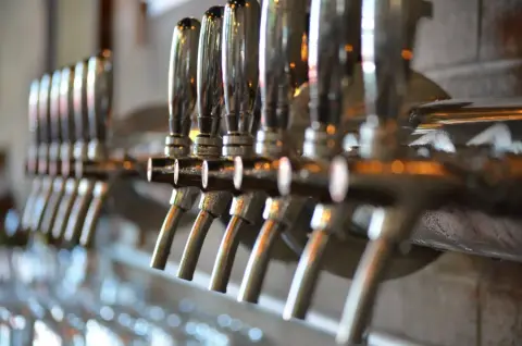 Close-up of the brewpub's beer taps