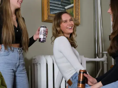 Young women enjoying Bulwark cider in the taproom