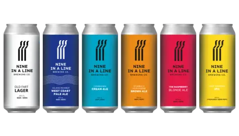 The six Nine in a Line core beer cans