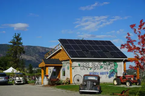 Front of the winery building with solar panels