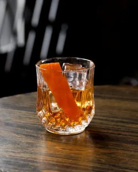 A spicy and aromatic twist on the Old Fashioned cocktail using Elettaria spiced gin in place of whisky