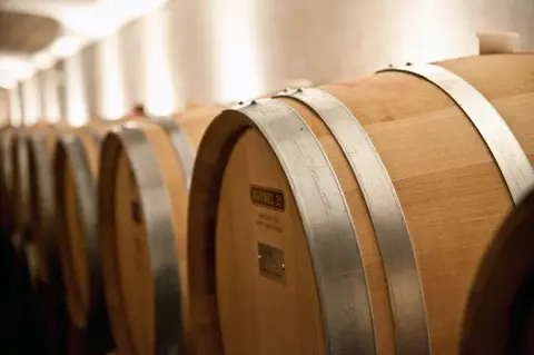 Oak barrels in the Peninsula Ridge barrel cellar