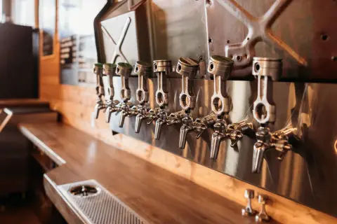 Piston-shaped tap handles at the brewpub