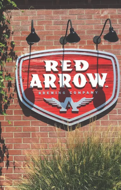 The Red Arrow sign on the brewery's red-brick building in Duncan