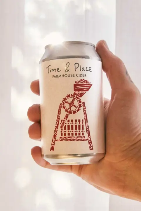 A can of Revel Time and Place wild-fermented cider