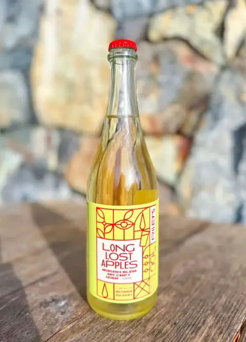 A 750 mL bottle of Riley's Cidery Long Lost Apples cider