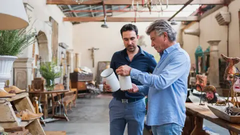 Two men in a store of wood items for a section on finding the perfect piece.