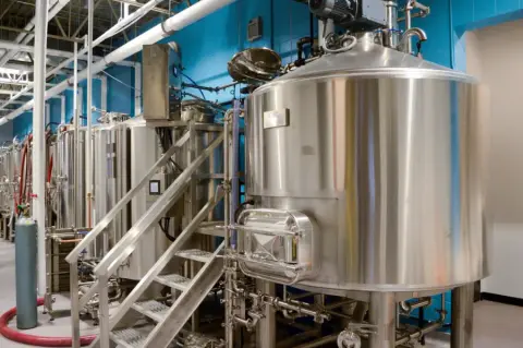 The brewhouse tanks at Sookram's in Fort Rouge