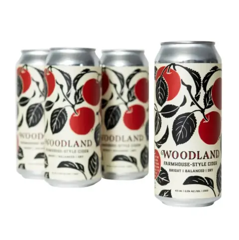 Cans of Strange Fellows Woodland farmhouse-style cider