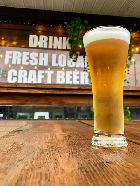 A pint of Switchback beer on the tasting room patio
