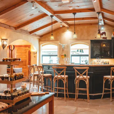 The Foreign Affair Winery tasting room bar and retail shelves