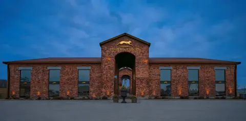 The Hare Wine Co. winery exterior at dusk