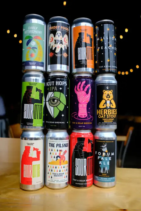 Cans of Tide & Boar beer