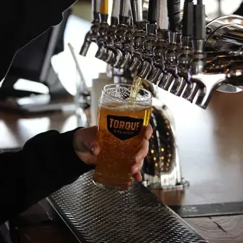 A Torque pint being poured at the taproom