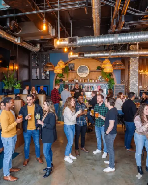 Vaycay Brew Pub taproom filled with guests enjoying drinks