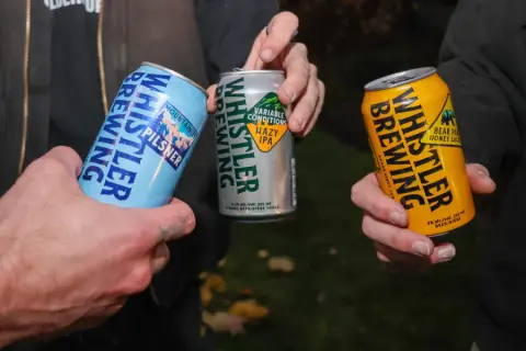 Whistler Brewing pilsner, IPA and honey lager cans